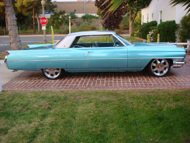 THIS IS A CUSTOM 1964 CADILLAC COUPE DEVILLE THAT HAS A LOT OF WELL PLACED